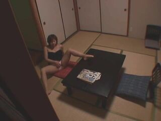 Spy cam captures Japanese woman's private moment of self-pleasure.